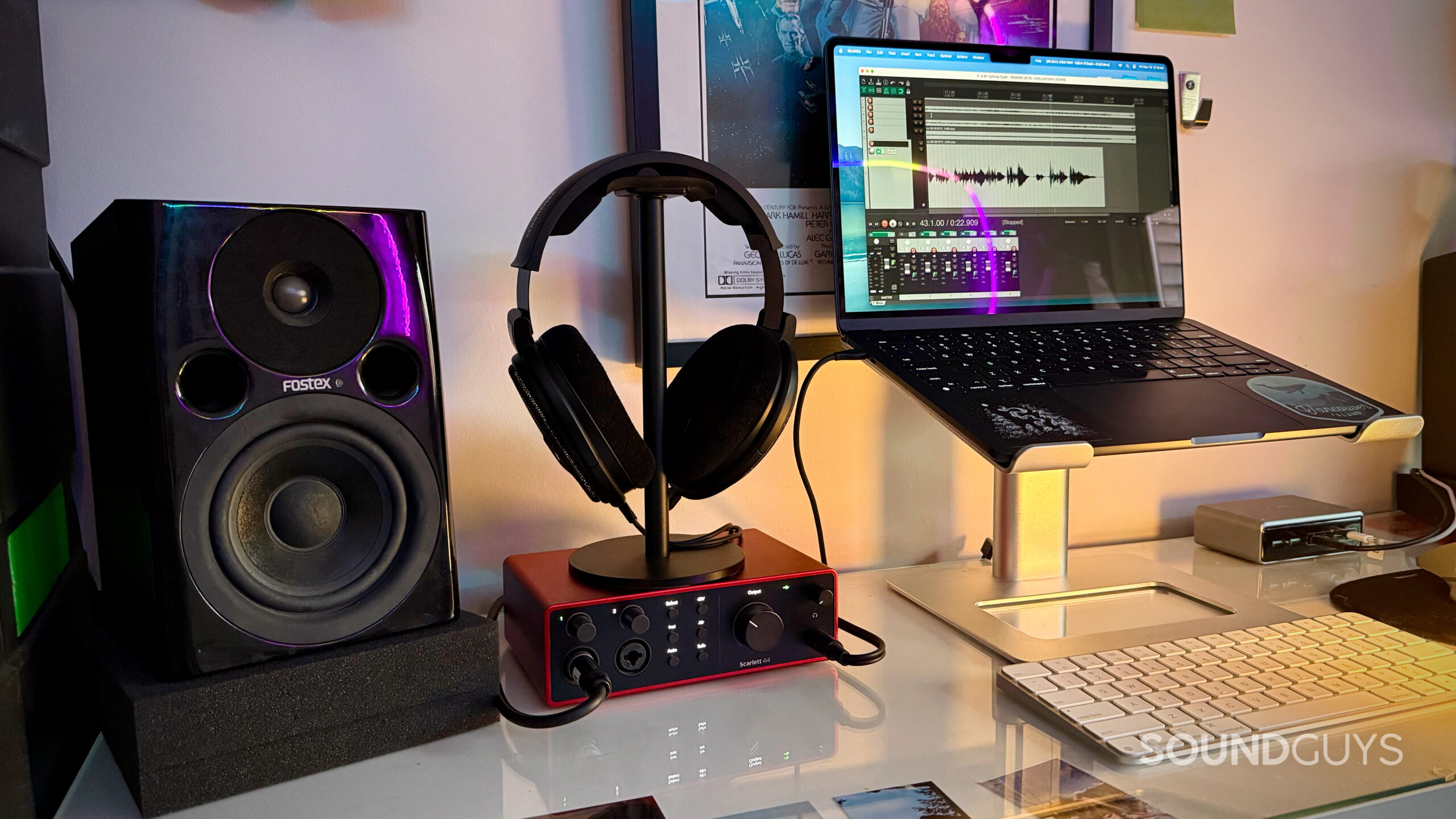 Don't buy a DAC - Dave desk - 1 A home desk setup with a Fostex monitor, a Focusrite Scarlett 4i4, open-back headphones, and a Mac laptop.