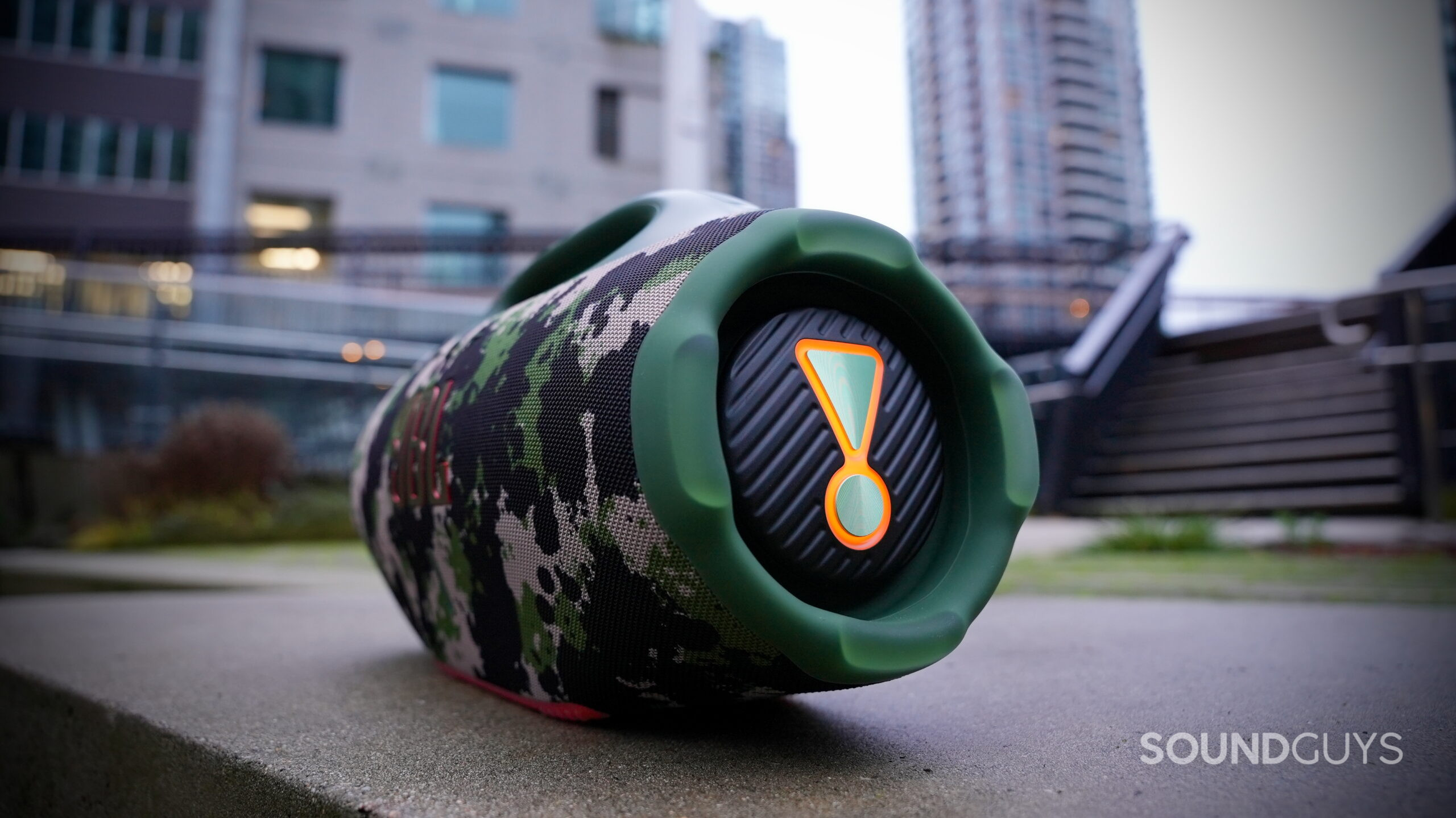 JBL Boombox (2.0) - 6 Photo of the JBL Boombox 4's passive radiator with illuminated orange JBL logo.